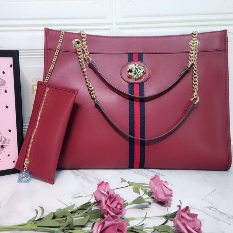 G*u*i shopping bags